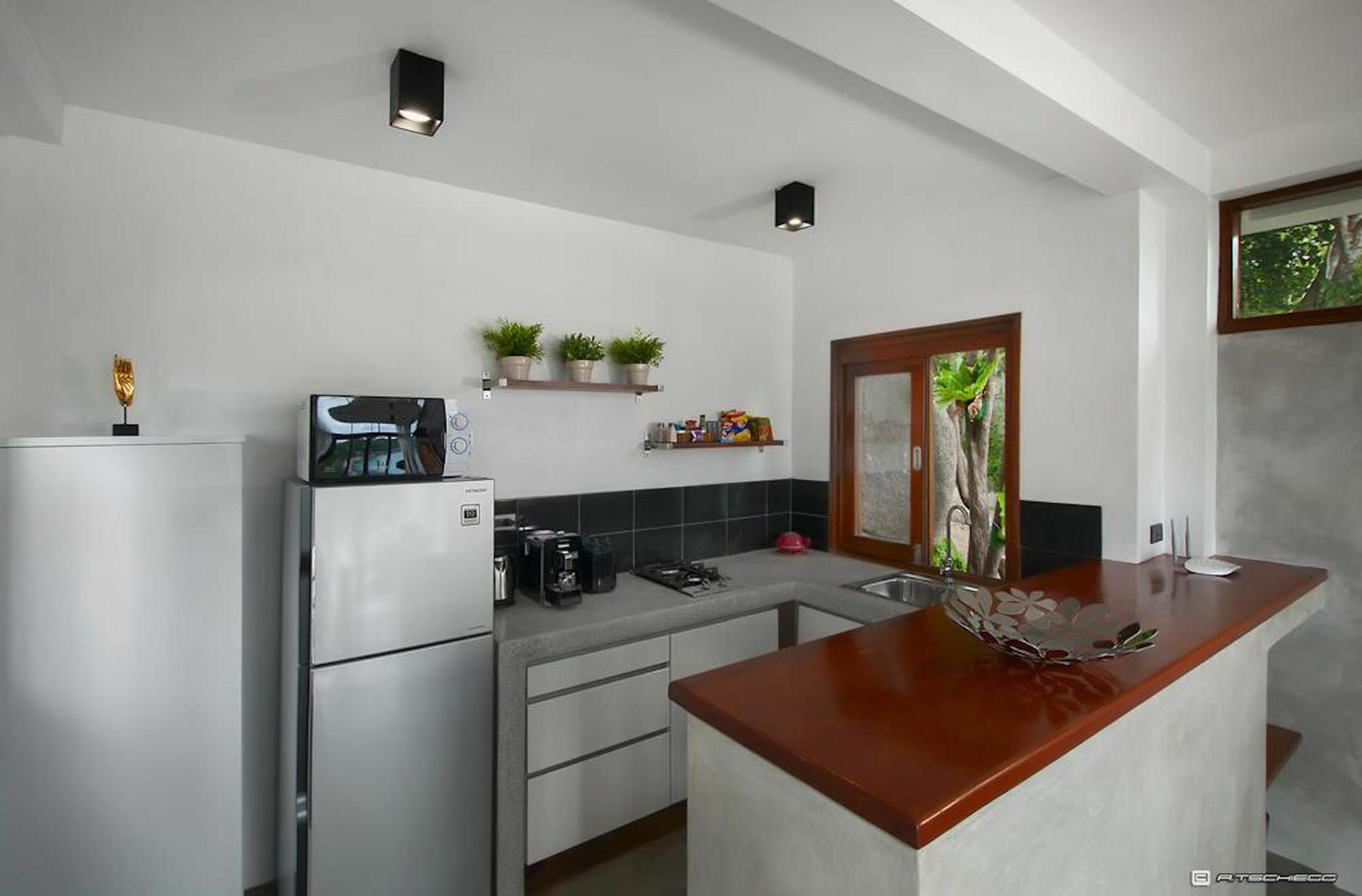 Villas Del Sol Тау Экстерьер фото